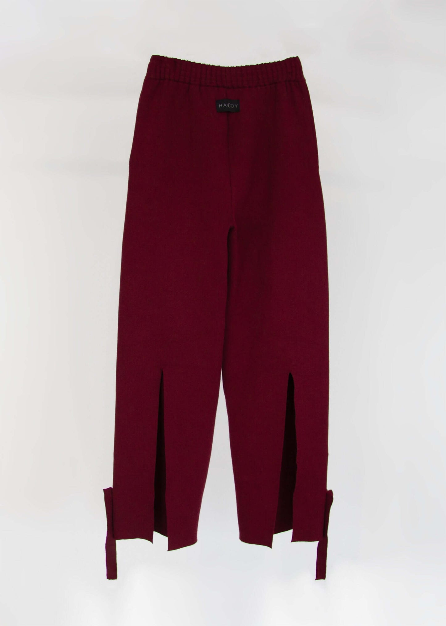 Sweetpants (Pre-order) in rich bordeaux, featuring side slits and an elastic waistband for comfort and style.