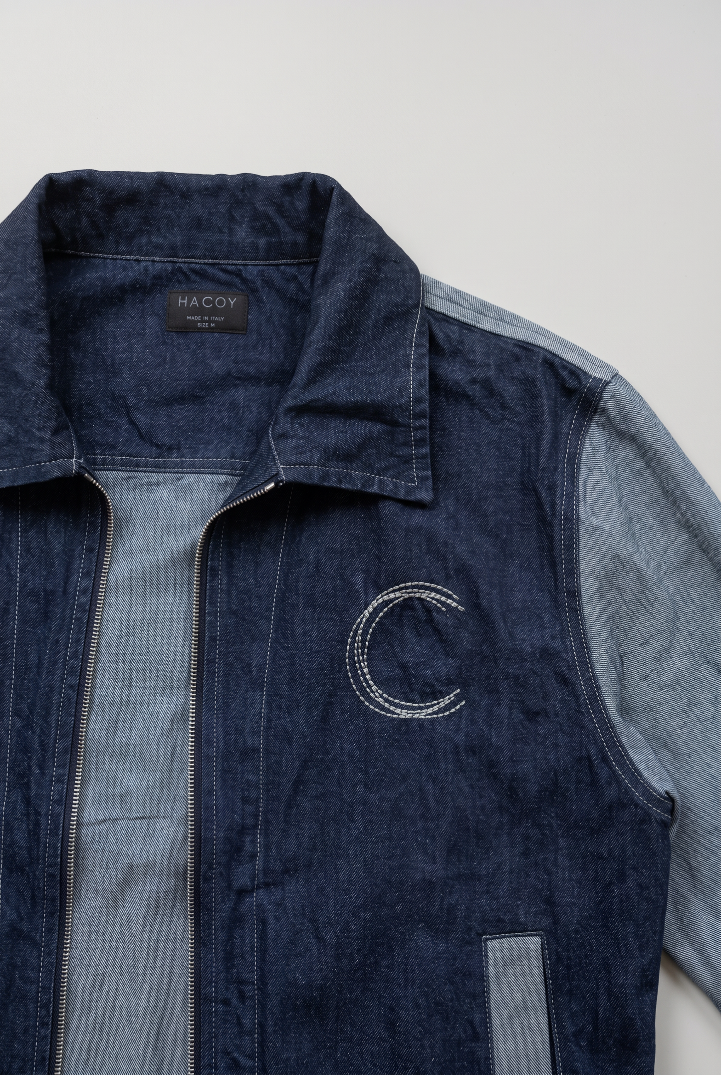 HACOY denim jacket detail, collar, monogram and made in Italy label