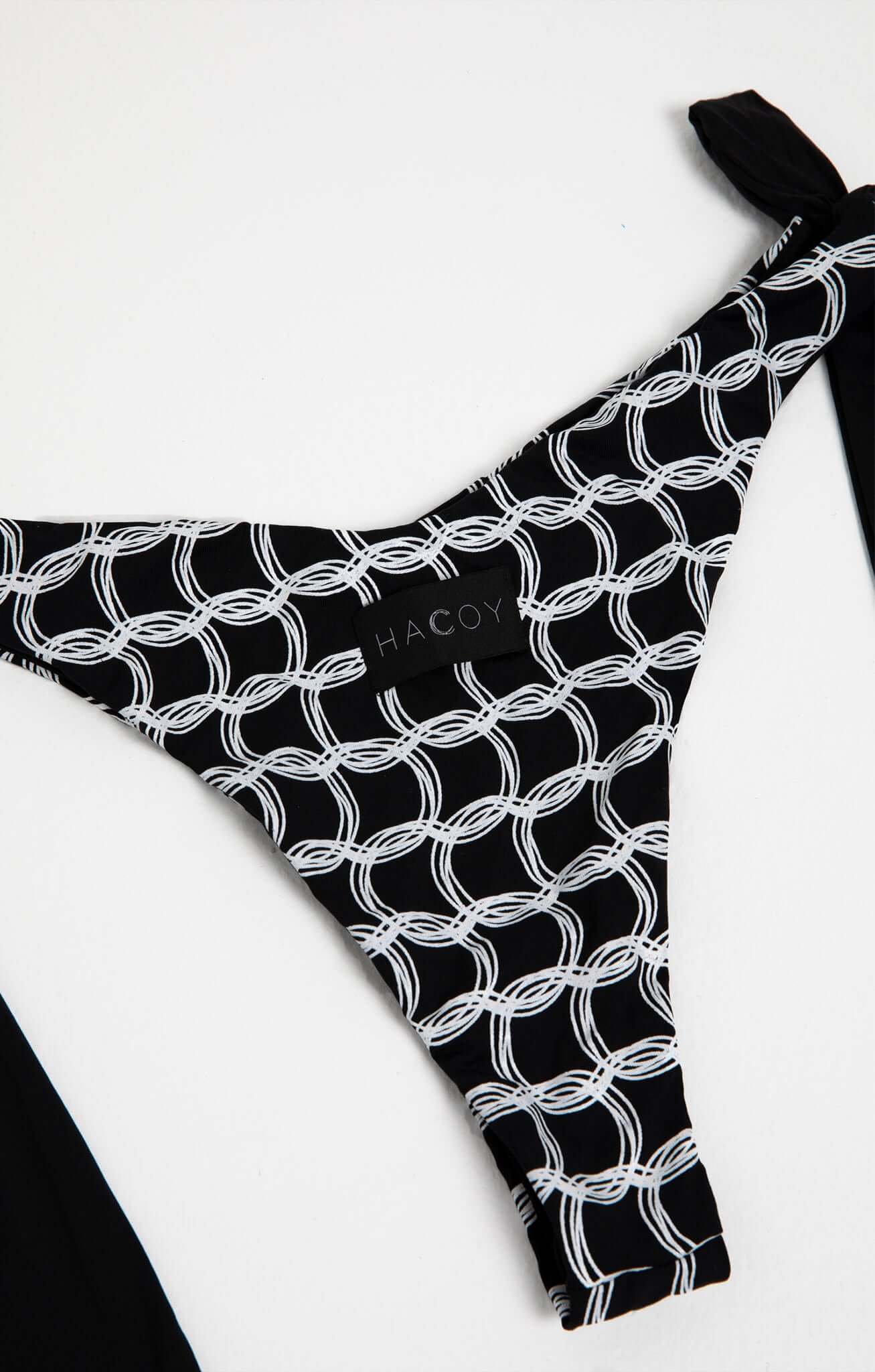Monogram Bikini high cut bottom featuring a unique black and white monogram pattern by HACOY.