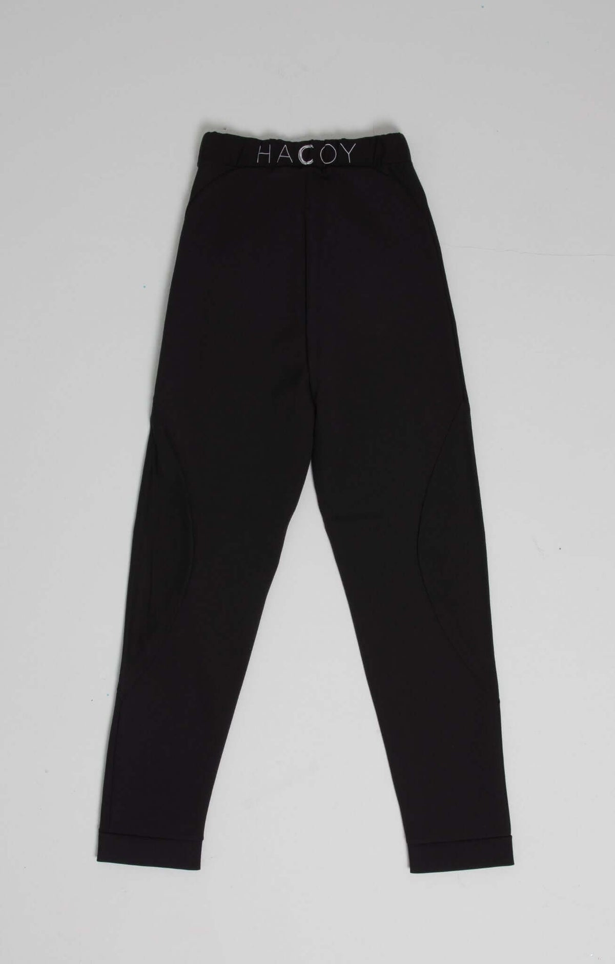 Sports Pants in black with fitted design and HACOY branding on the waist, optimized for comfort during exercise.