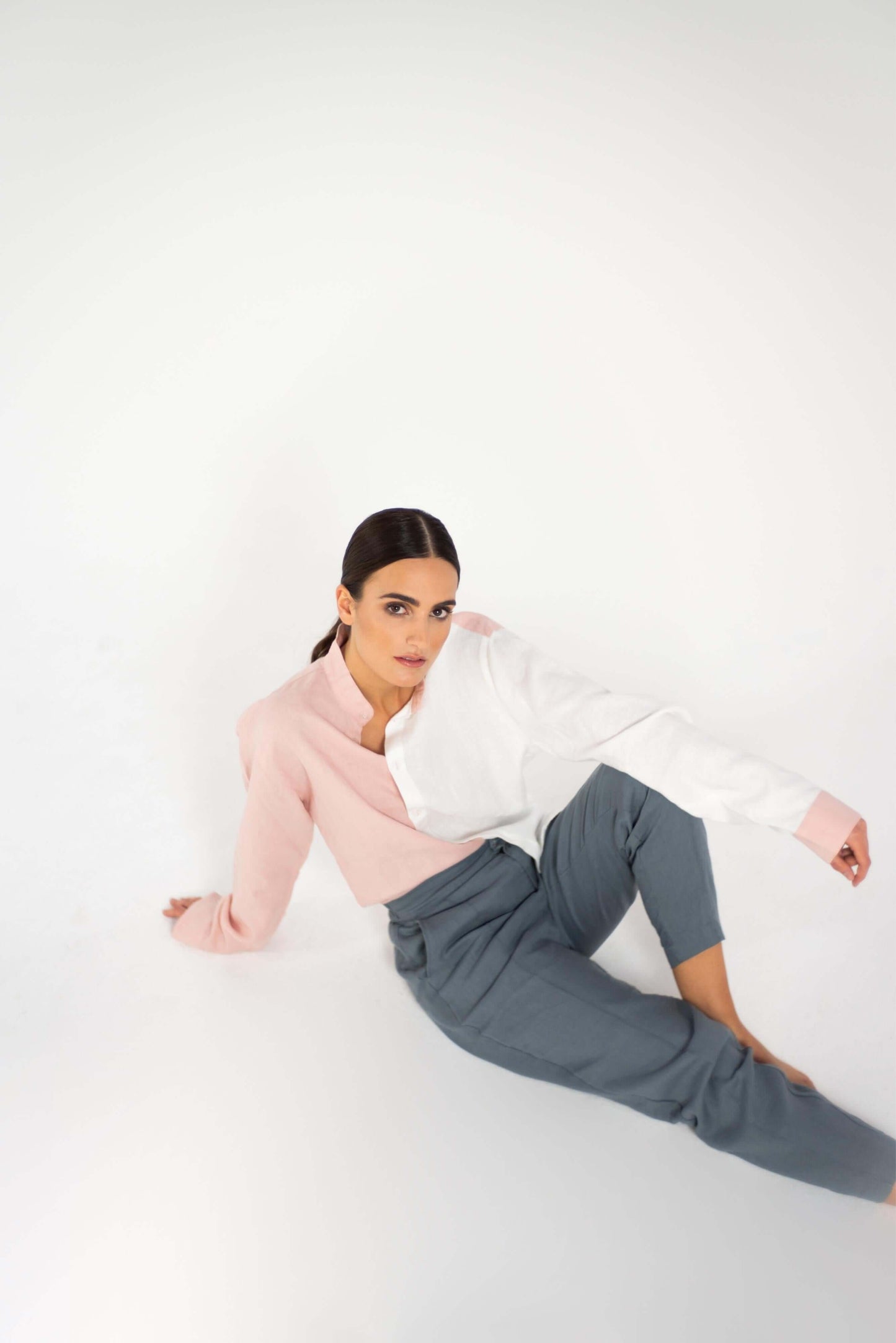Linen Dual Shirt (Pre-owned) worn by a model, showcasing its unique split design and stylish colors.