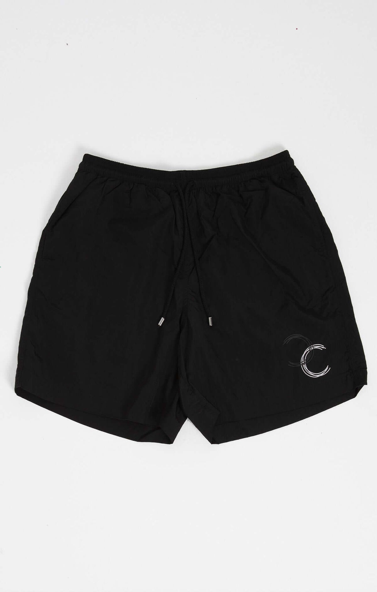 Black swim shorts featuring the HACOY logo, designed for style and comfort, perfect for poolside and beach activities.