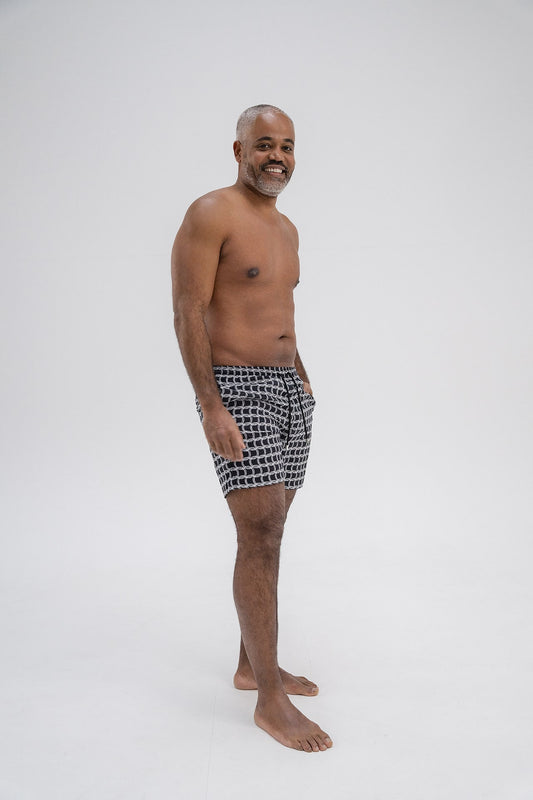 Front view of HACOY Monogram Swim Shorts for men Made in Italy premium fabric